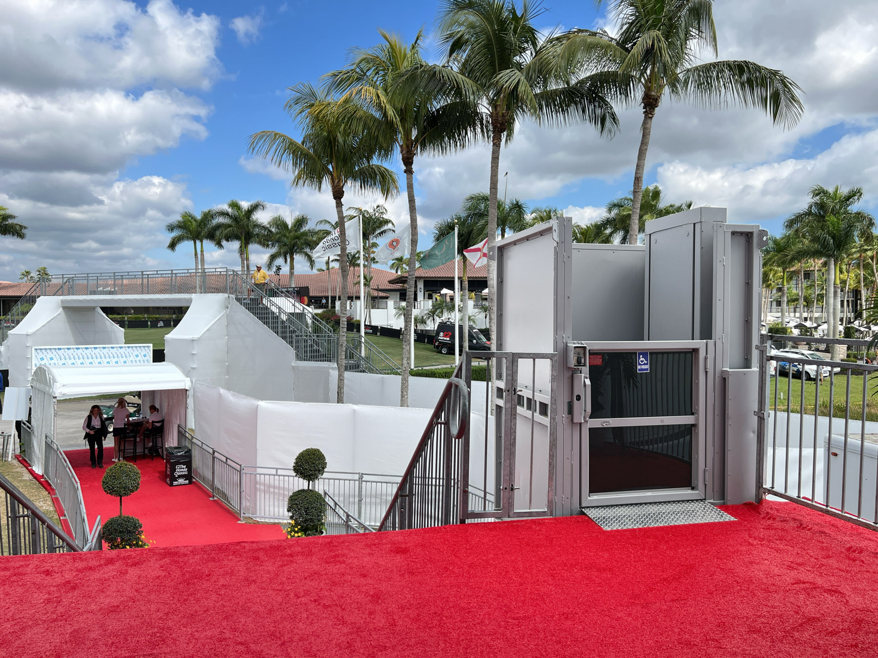 12' ADA Lift Rental accessing a hospitality structure and the Honda Classic Golf Tournament