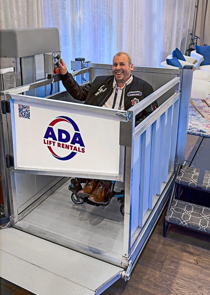 EZ Stage Lift in use by a man in a wheelchair