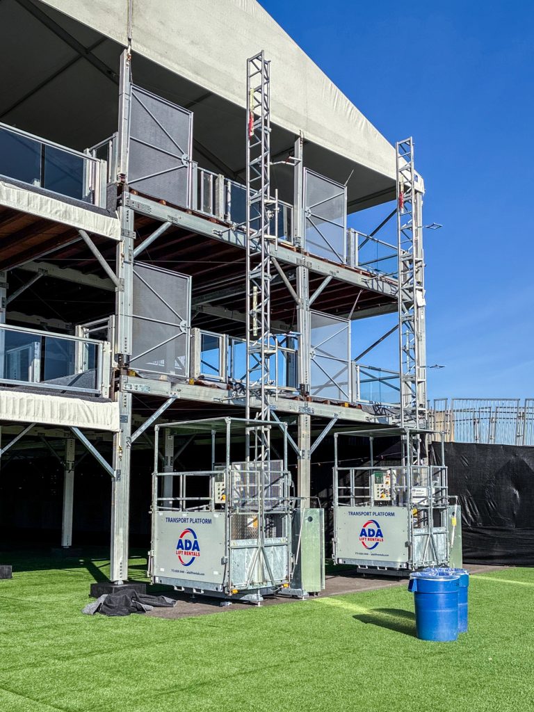 Two, ADA Lift Rentals' transport platforms at the Bourbon & Beyond music festival.