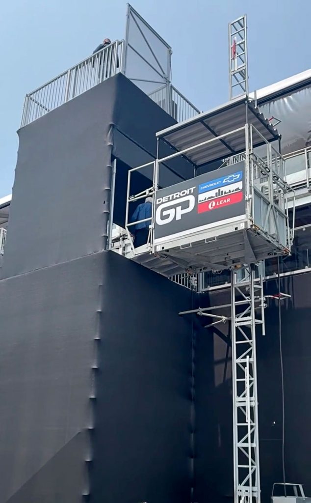 ADA Lift Rentals' transport platform accessing the upper level of a structure at the Detroit Grand Prix.