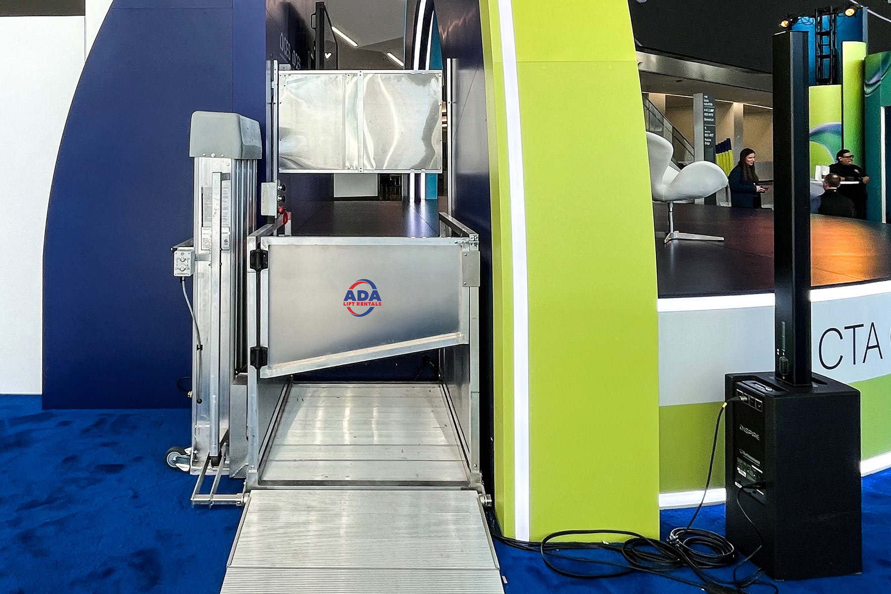 EZ stage lift rental at a conference.